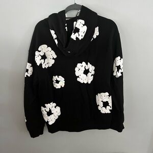 Denim Tears Black Hoodie with White Floral Design
